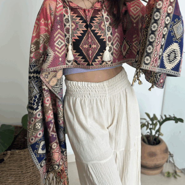 Capita / Poncho Rosa